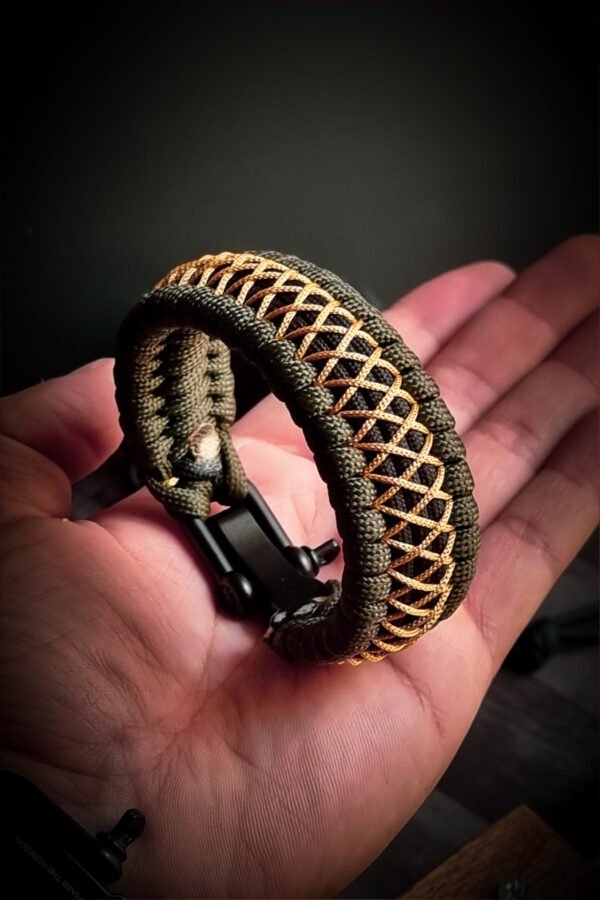 handmade paracord bracelet from green and golden paracord type 3 with shackle bukle