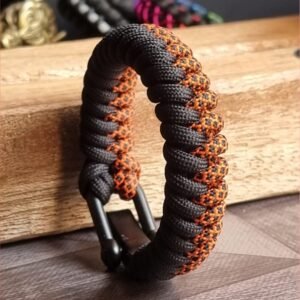 handmade paracord bracelet made with orange camo and black paracord 550 with shackle buckle