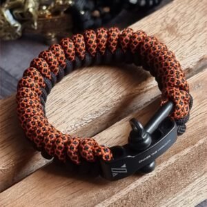 handmade paracord bracelet made with orange camo and black paracord 550 with shackle buckle