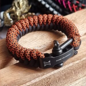 handmade paracord bracelet made with orange camo and black paracord 550 with shackle buckle