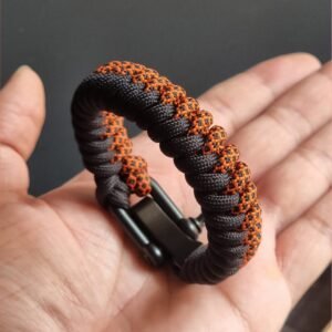 handmade paracord bracelet made with orange camo and black paracord 550 with shackle buckle