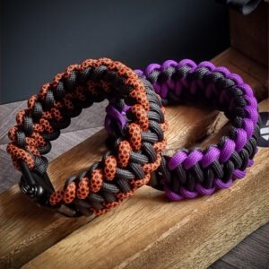 handmade stitched paracord bracelet made with 4mm black, purple, orange camo paracords, with brass adjustable shackle buckle
