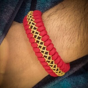 handmade paracord bracelet from Red and golden paracord type 3 with adjustable shackle buckle