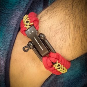 handmade paracord bracelet from Red and golden paracord type 3 with adjustable shackle buckle