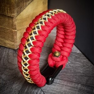 handmade paracord bracelet from Red and golden paracord type 3 with adjustable shackle buckle