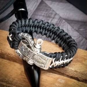 Handmade paracord bracelet with Black 4mm paracord and off white micro cord with adjustable tribal Egyptian shackle buckle