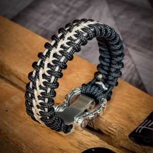 Handmade paracord bracelet with Black 4mm paracord and off white micro cord with adjustable tribal Egyptian shackle buckle