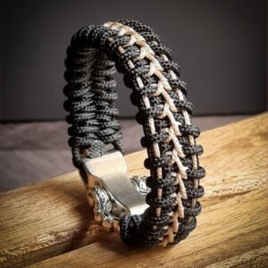 Handmade paracord bracelet with Black 4mm paracord and off white micro cord with adjustable tribal Egyptian shackle buckle
