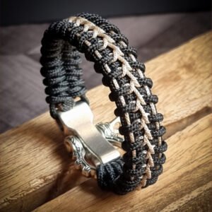 Handmade paracord bracelet with Black 4mm paracord and off white micro cord with adjustable tribal Egyptian shackle buckle
