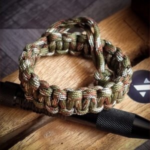 Army Camo paracord bracelet which resembles Tom Hardy's paracord bracelet from the movie Mad Max Fury Road