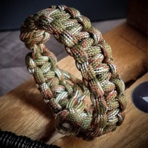Army Camo paracord bracelet which resembles Tom Hardy's paracord bracelet from the movie Mad Max Fury Road