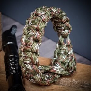 Army Camo paracord bracelet which resembles Tom Hardy's paracord bracelet from the movie Mad Max Fury Road