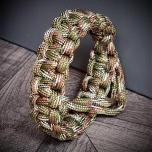 Army Camo paracord bracelet which resembles Tom Hardy's paracord bracelet from the movie Mad Max Fury Road