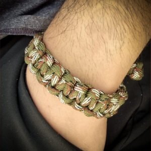 Army Camo paracord bracelet which resembles Tom Hardy's paracord bracelet from the movie Mad Max Fury Road
