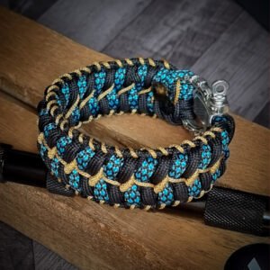handmade stitched paracord bracelet with intricate designs using Black, Blue camo and golden paracord with adjustable silver brass tribal buckle