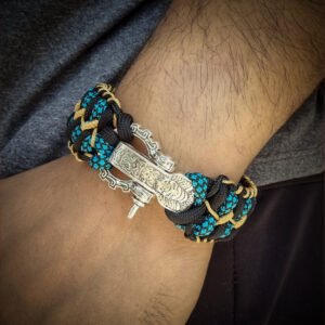 handmade stitched paracord bracelet with intricate designs using Black, Blue camo and golden paracord with adjustable silver brass tribal buckle