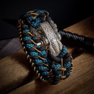 handmade stitched paracord bracelet with intricate designs using Black, Blue camo and golden paracord with adjustable silver brass tribal buckle