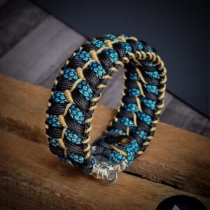 handmade stitched paracord bracelet with intricate designs using Black, Blue camo and golden paracord with adjustable silver brass tribal buckle