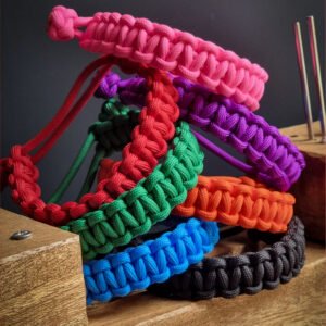 handmade stitched adjustable paracord bracelet which resembles Tom Hardy's paracord bracelet from the movie Mad Max Fury Road