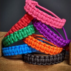 handmade stitched adjustable paracord bracelet which resembles Tom Hardy's paracord bracelet from the movie Mad Max Fury Road