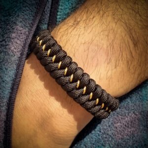 handmade paracord bracelet Adjustable made with black paracord 550 and Golden Micro cord