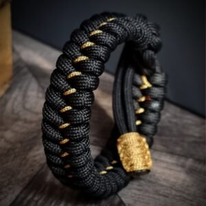 handmade paracord bracelet Adjustable made with black paracord 550 and Golden Micro cord