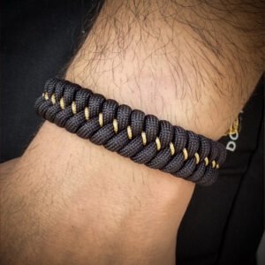 handmade paracord bracelet Adjustable made with black paracord 550 and Golden Micro cord