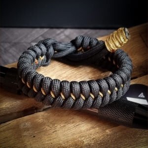 handmade paracord bracelet Adjustable made with black paracord 550 and Golden Micro cord