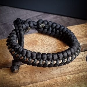 handmade adjustable paracord bracelet with black and golden paracord