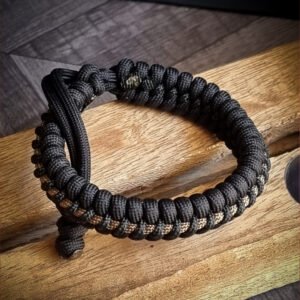 handmade adjustable paracord bracelet with black and golden paracord