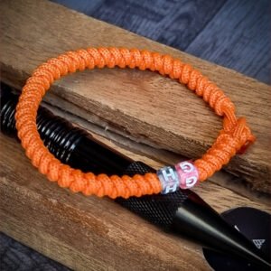 Premium Handmade unisex paracord bracelet with custom name initials in neon orange color
