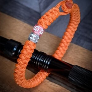 Premium Handmade unisex paracord bracelet with custom name initials in neon orange color