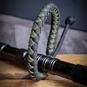 handmade slim 4 strand round braid knot bracelet in olive green and black paracord 550 adjustable