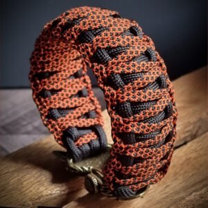 premium handmade paracord bracelet in black and orange double layer design with brass wolf Vikings tribal buckle