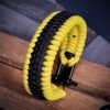 premium handmade paracord 550 bracelet with yellow and black paracord with black micro cord web deisgn and adjustable shackle buckle