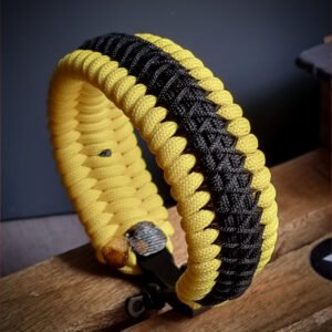 premium handmade paracord 550 bracelet with yellow and black paracord with black micro cord web deisgn and adjustable shackle buckle