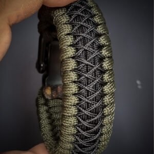 premium handmade paracord 550 bracelet with green and black paracord with black micro cord web design and adjustable shackle buckle