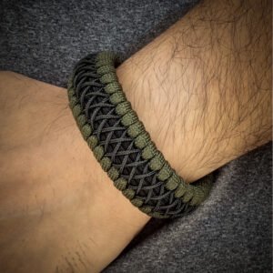 premium handmade paracord 550 bracelet with green and black paracord with black micro cord web design and adjustable shackle buckle