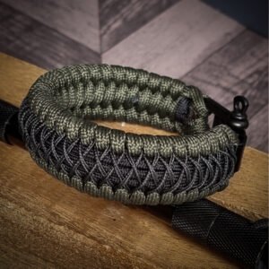 premium handmade paracord 550 bracelet with green and black paracord with black micro cord web design and adjustable shackle buckle