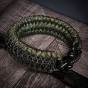 premium handmade paracord 550 bracelet with green and black paracord with black micro cord web design and adjustable shackle buckle