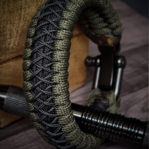 premium handmade paracord 550 bracelet with green and black paracord with black micro cord web design and adjustable shackle buckle
