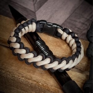 premium handmade bootstrap weave knot bracelet in black and tan brown dual tone color with quick release buckle