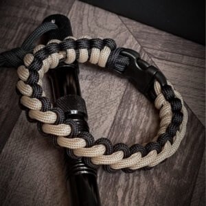 premium handmade bootstrap weave knot bracelet in black and tan brown dual tone color with quick release buckle
