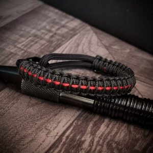Paracord bracelet with micro-cord stitching with thin red line style